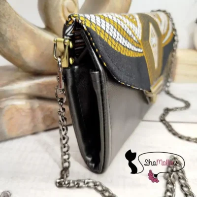 Pochette de soirée en similicuir noir & wax géométrique noir/blanc à paillettes dorées